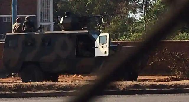 Soldiers Patrolling The Streets Of Harare, Ordering People To Behave