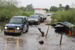 Pictures: Lorry overturns crossing 'flooded river' in Hillside, Harare