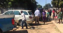 Video: Bizarre Ritual as man walks around with two huge snakes